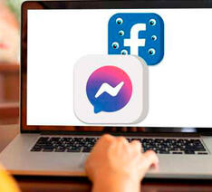 Person bruger sin computer til Facebook og Messenger